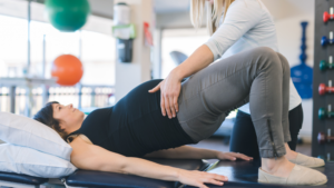 pregnant woman doing pelvic floor physical therapy