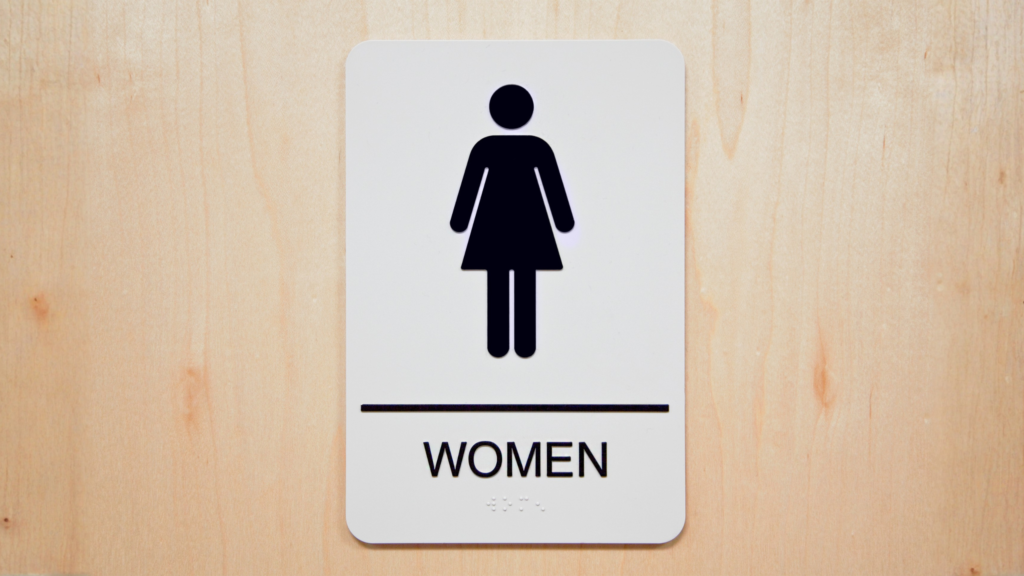 sign to the womens restroom