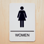 sign to the womens restroom