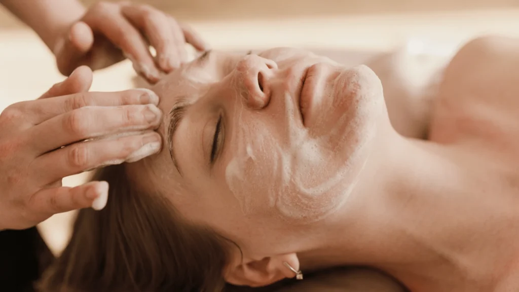 woman getting a facial at spa skincare