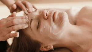 woman getting a facial at spa skincare